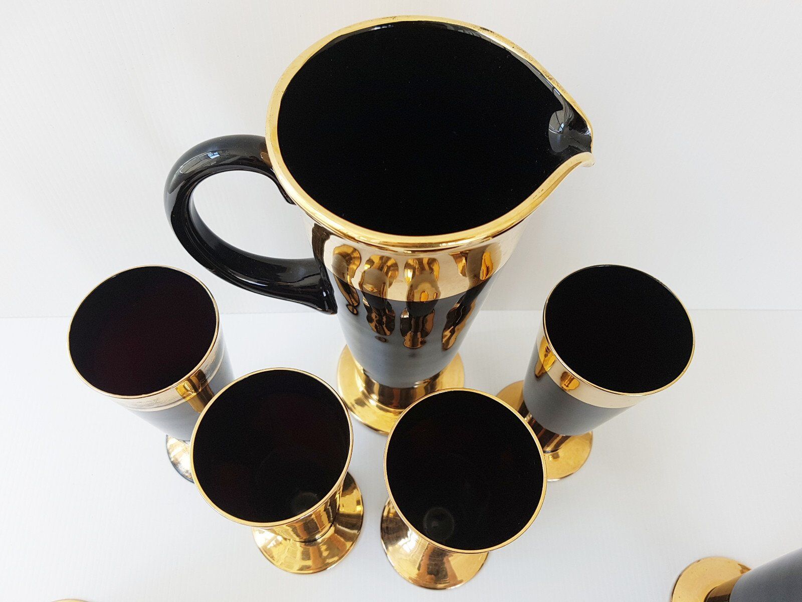 Vintage 1950s black and gold glass lemonade service.