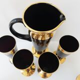 Vintage 1950s black and gold glass lemonade service.
