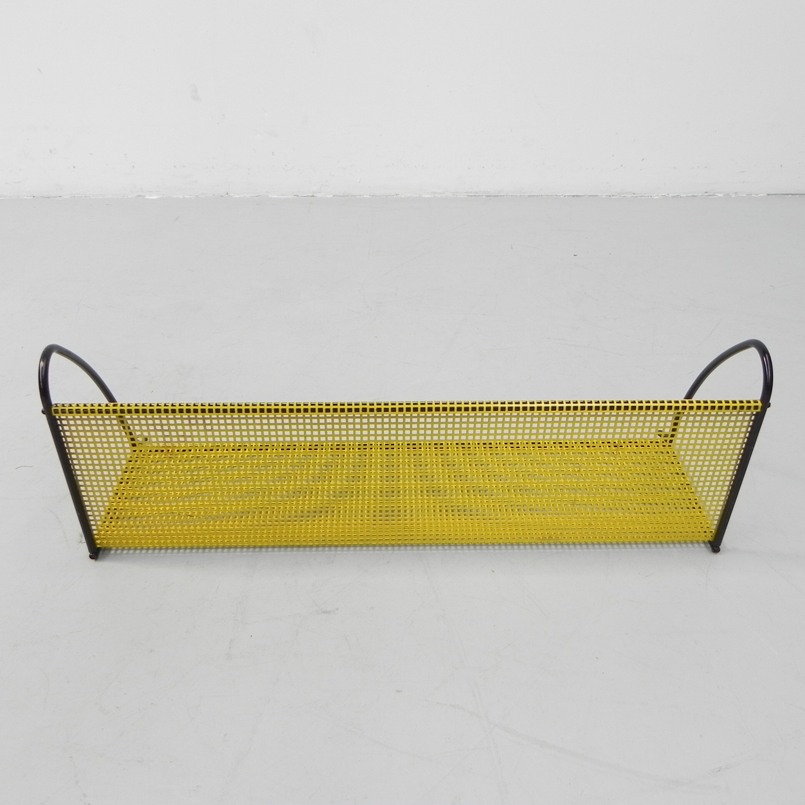 Pilastro wall rack with perforated steel plate