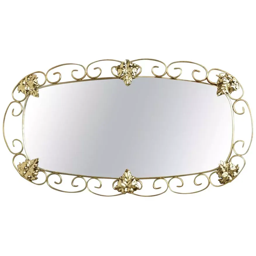 Miroir ovale années 50 en laiton - 38x69cm