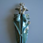 Surreal ceramic sculpture in relief signed to be identified.