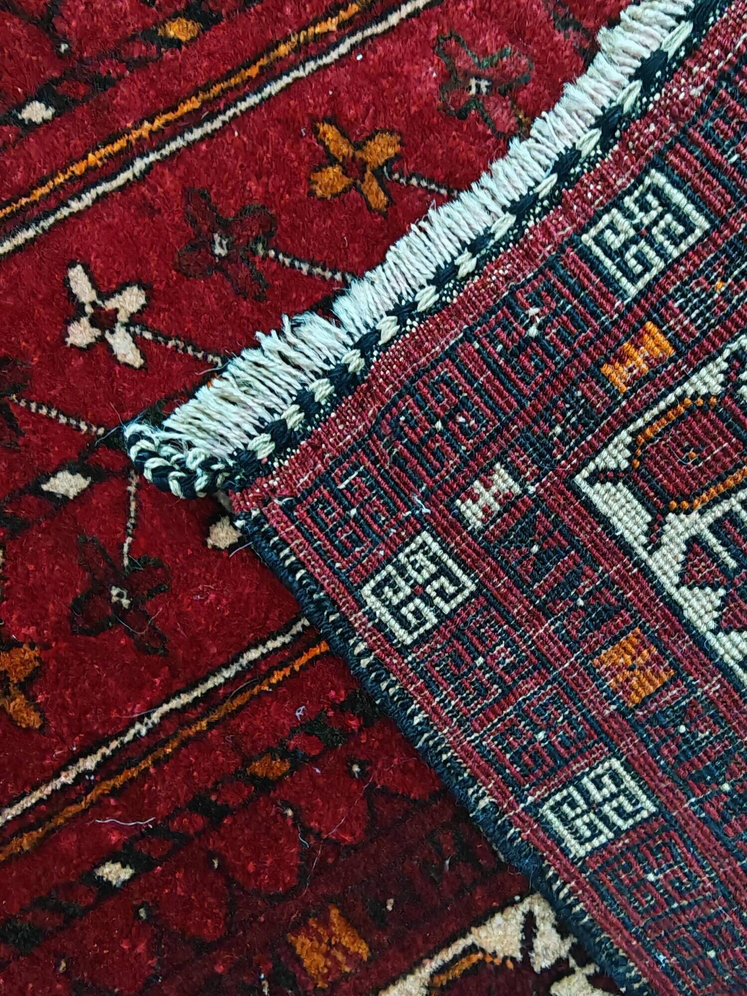 Vintage Afghan tribal prayer rug, hand-knotted from the 1950s.