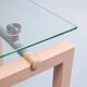Three nesting tables from the 90s made of painted metal and tempered glass.