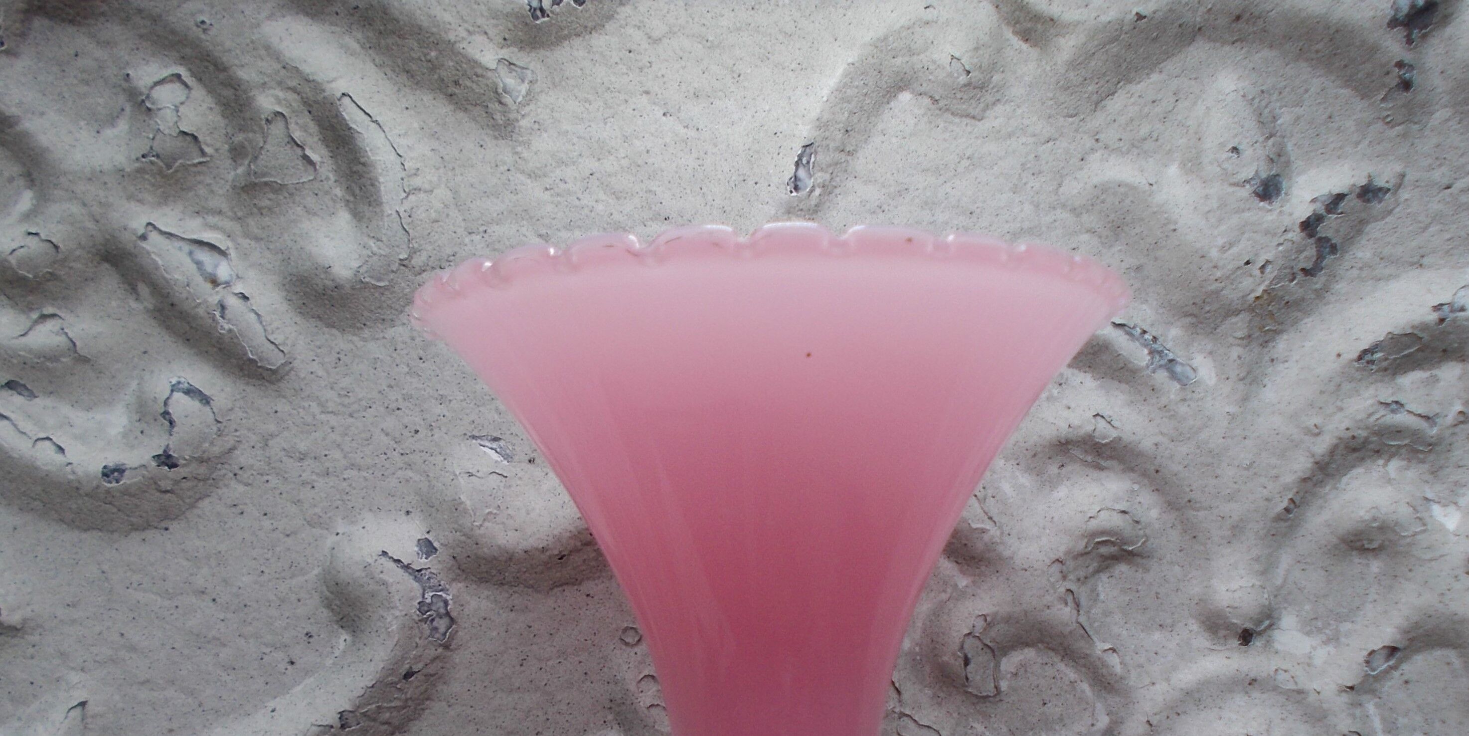 Pink opaline soliflore vase with white opalescent foot