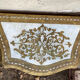 Pairs of Florentine bedside tables in gilded wood.