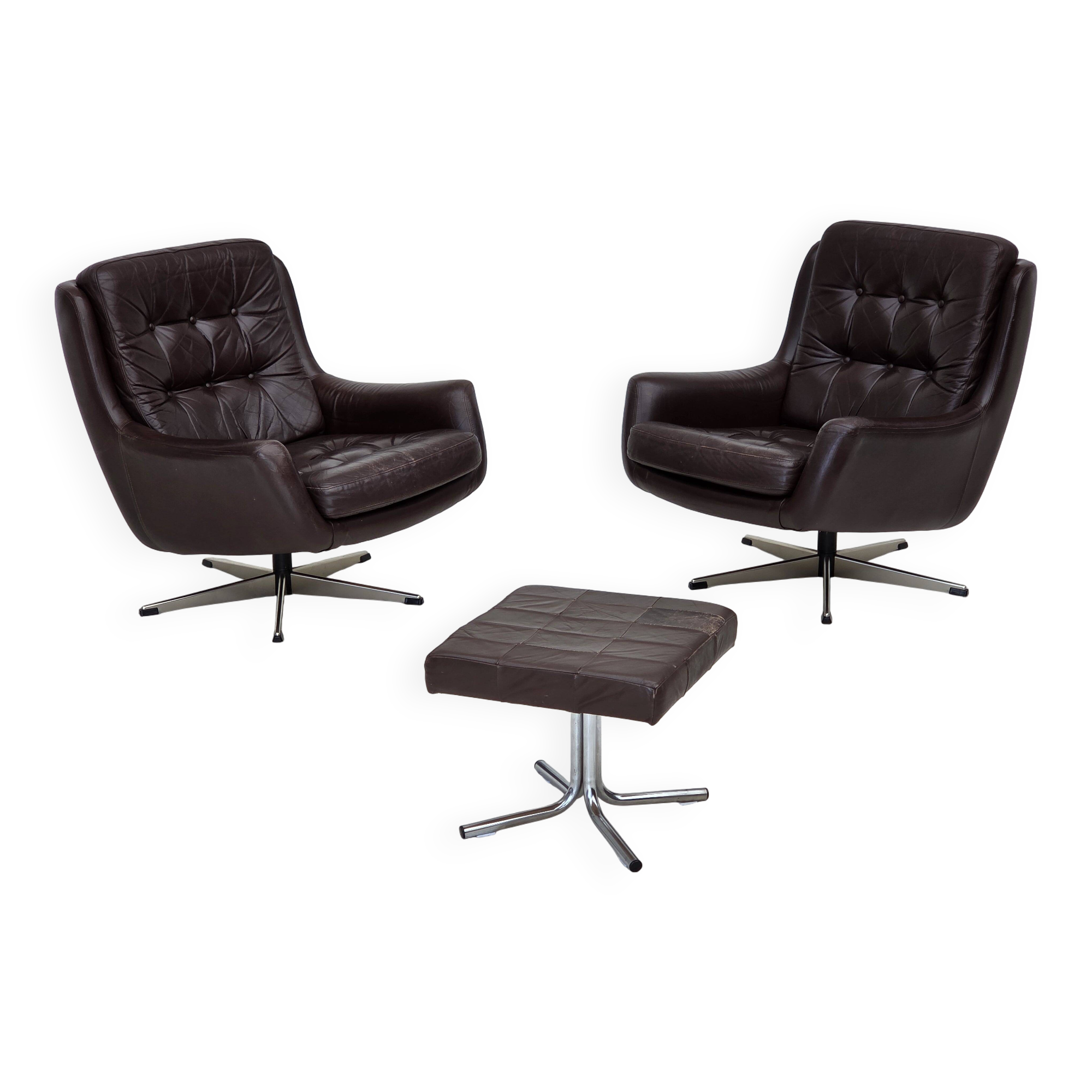 1970s, set of two swivel lounge chairs with footstool, leather.