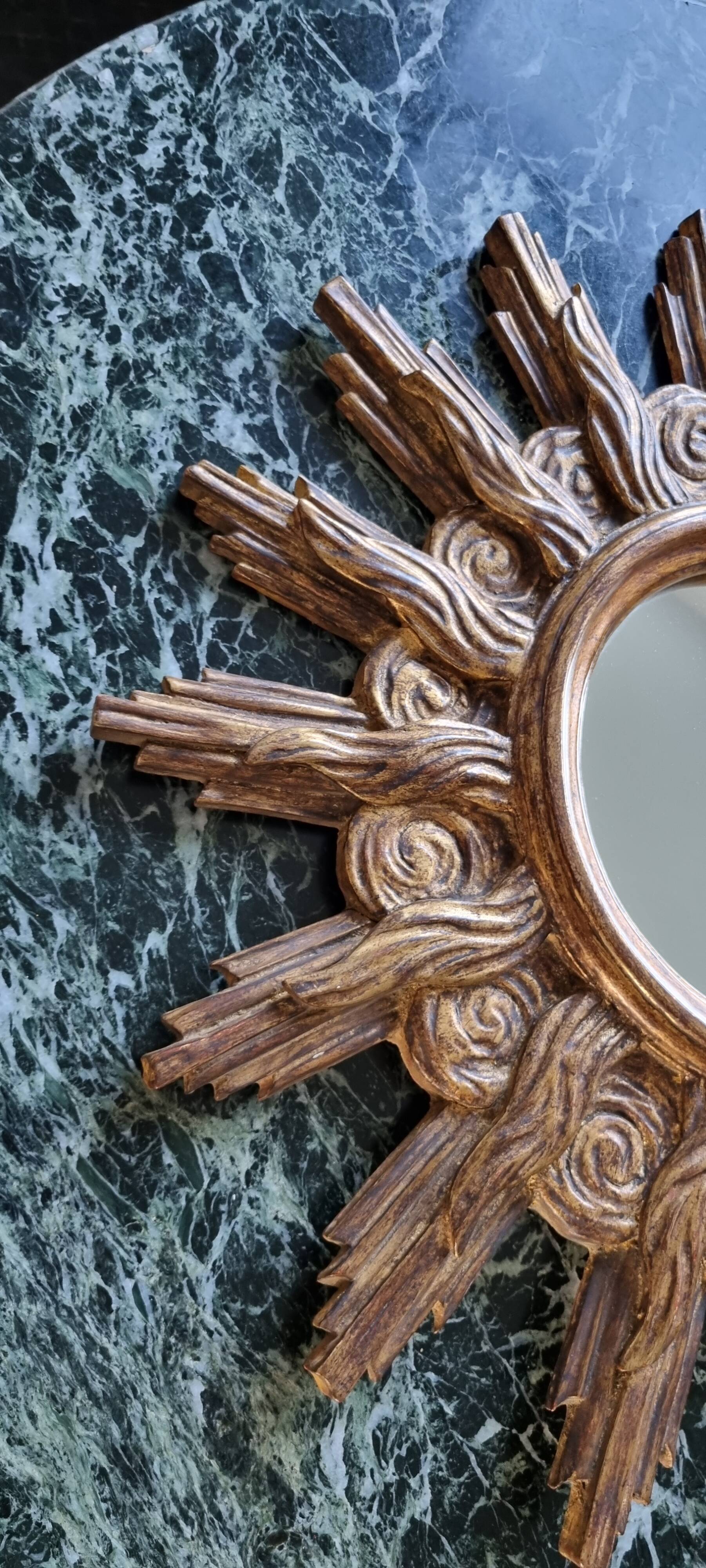 Vintage wooden and gold sun mirror