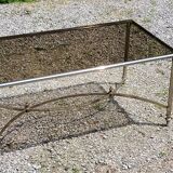 Coffee table from the 70s in chrome metal with smoked glass top in neo-classical style