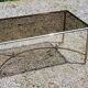 Coffee table from the 70s in chrome metal with smoked glass top in neo-classical style