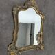 Miroir Louis XV en bois doré à cartouche