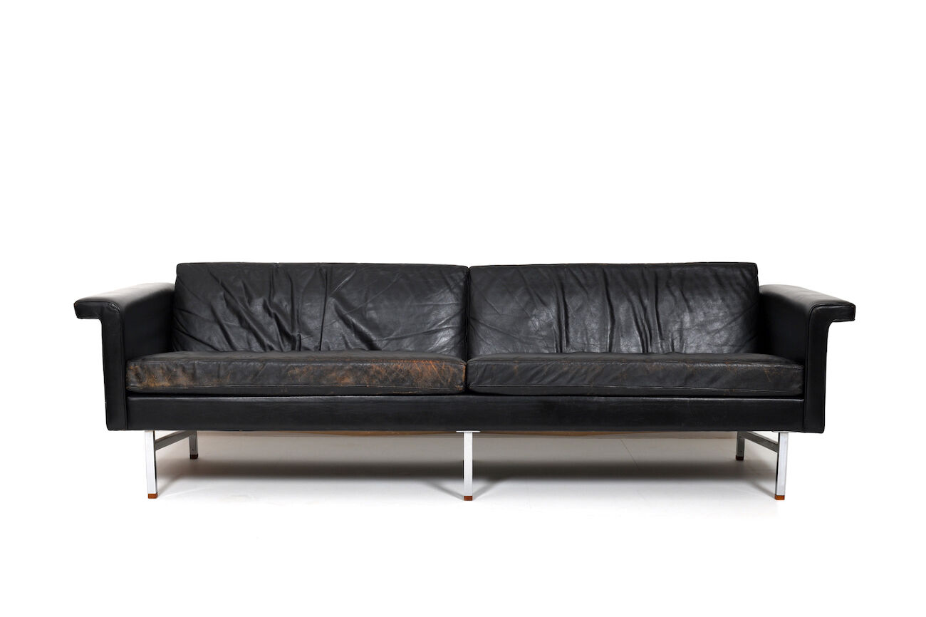 Danish leather sofa with chrome legs and teak ends