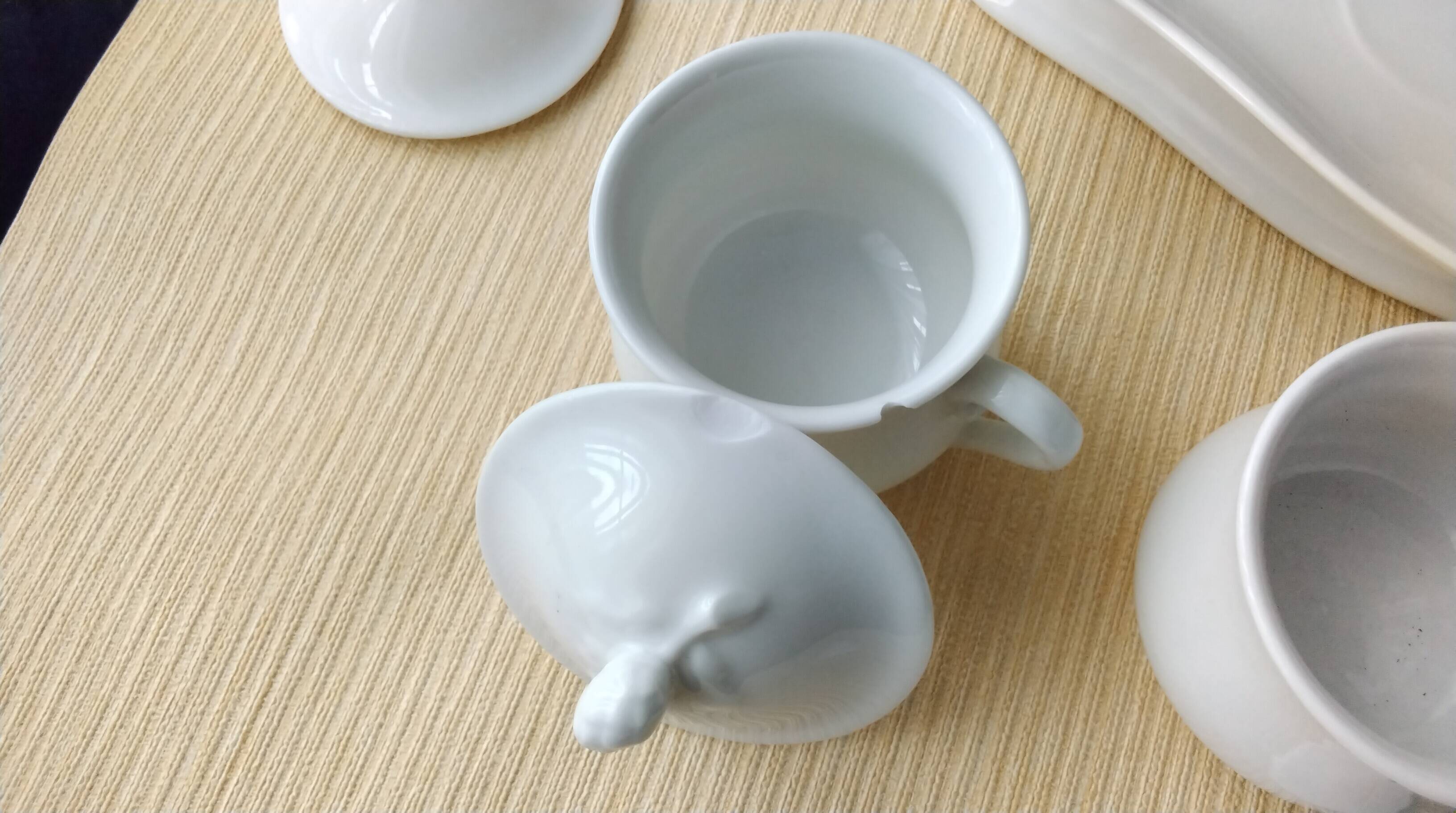 Antique white porcelain cream service