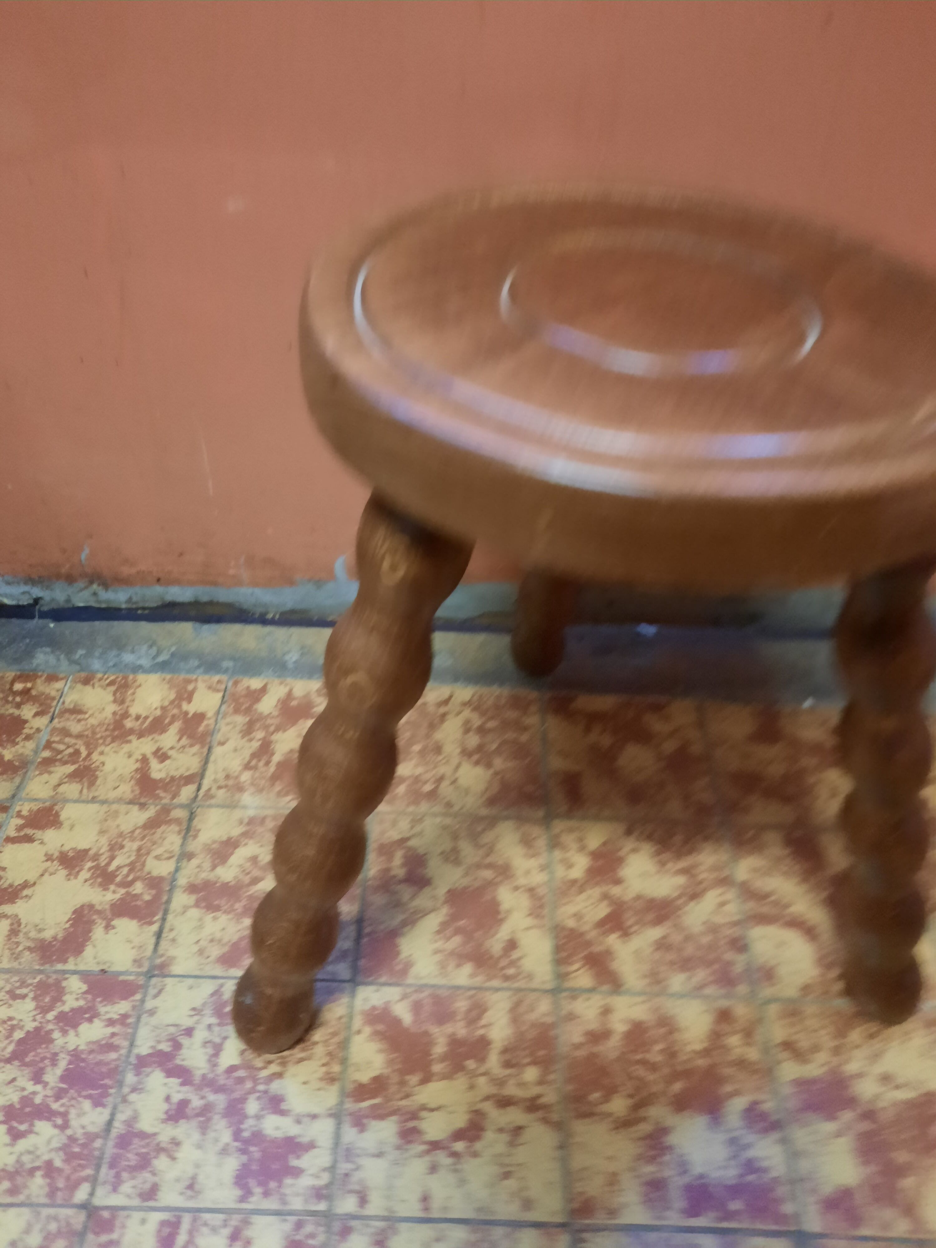 Wooden tripod stool