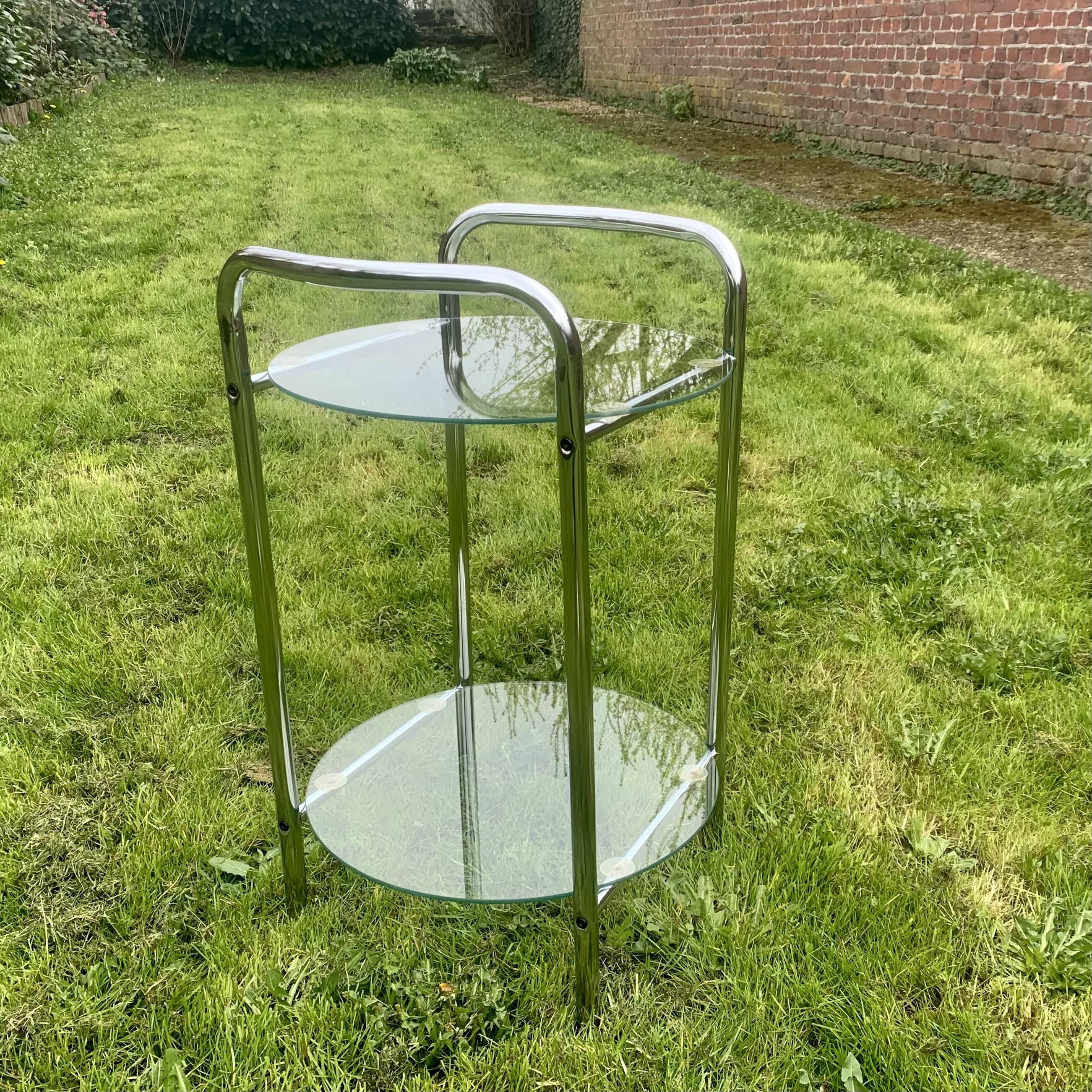 Pedestal table, vintage chrome steel saddle with 2 round windows