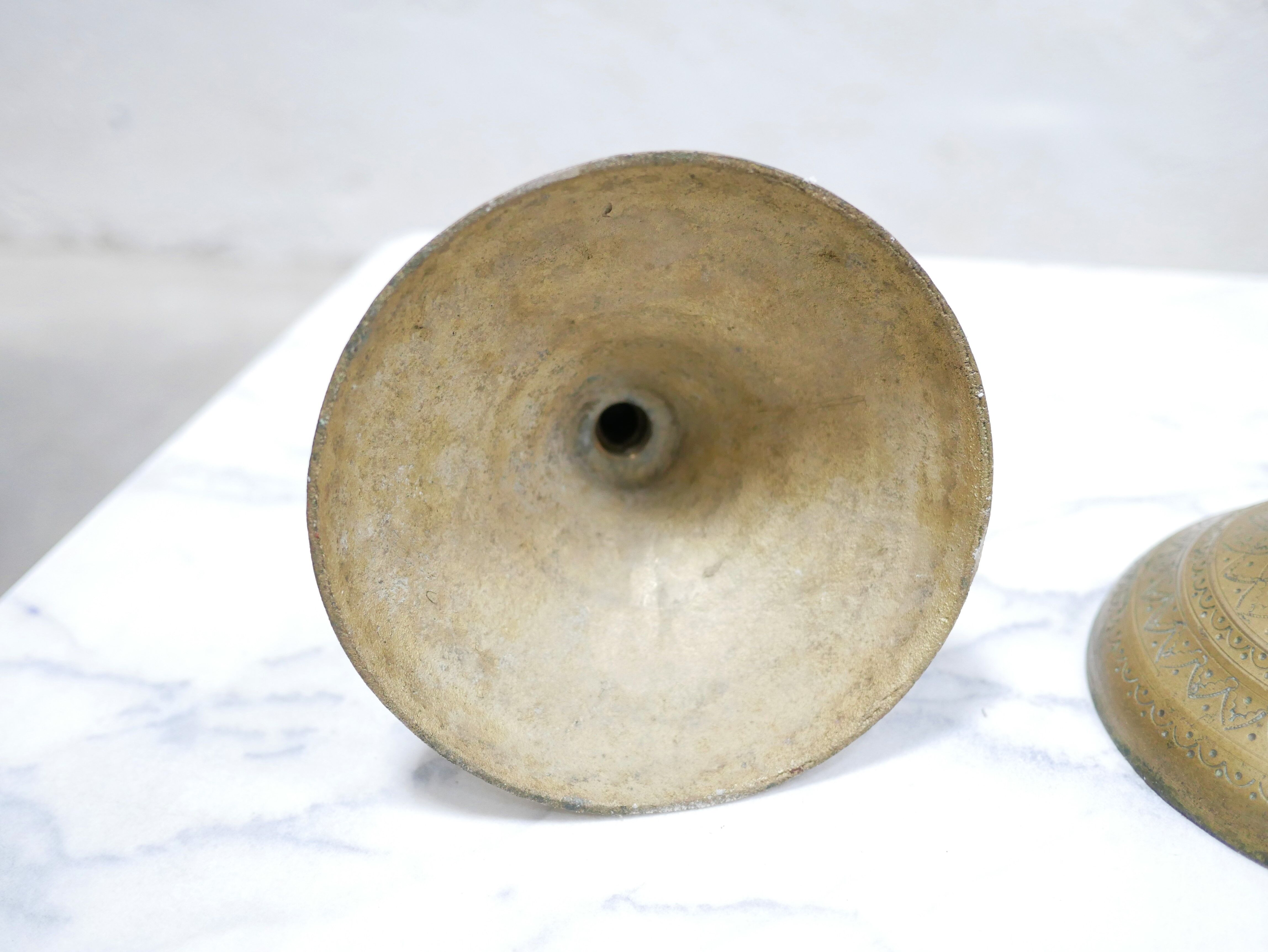 Pair of vintage candle holders in golden brass