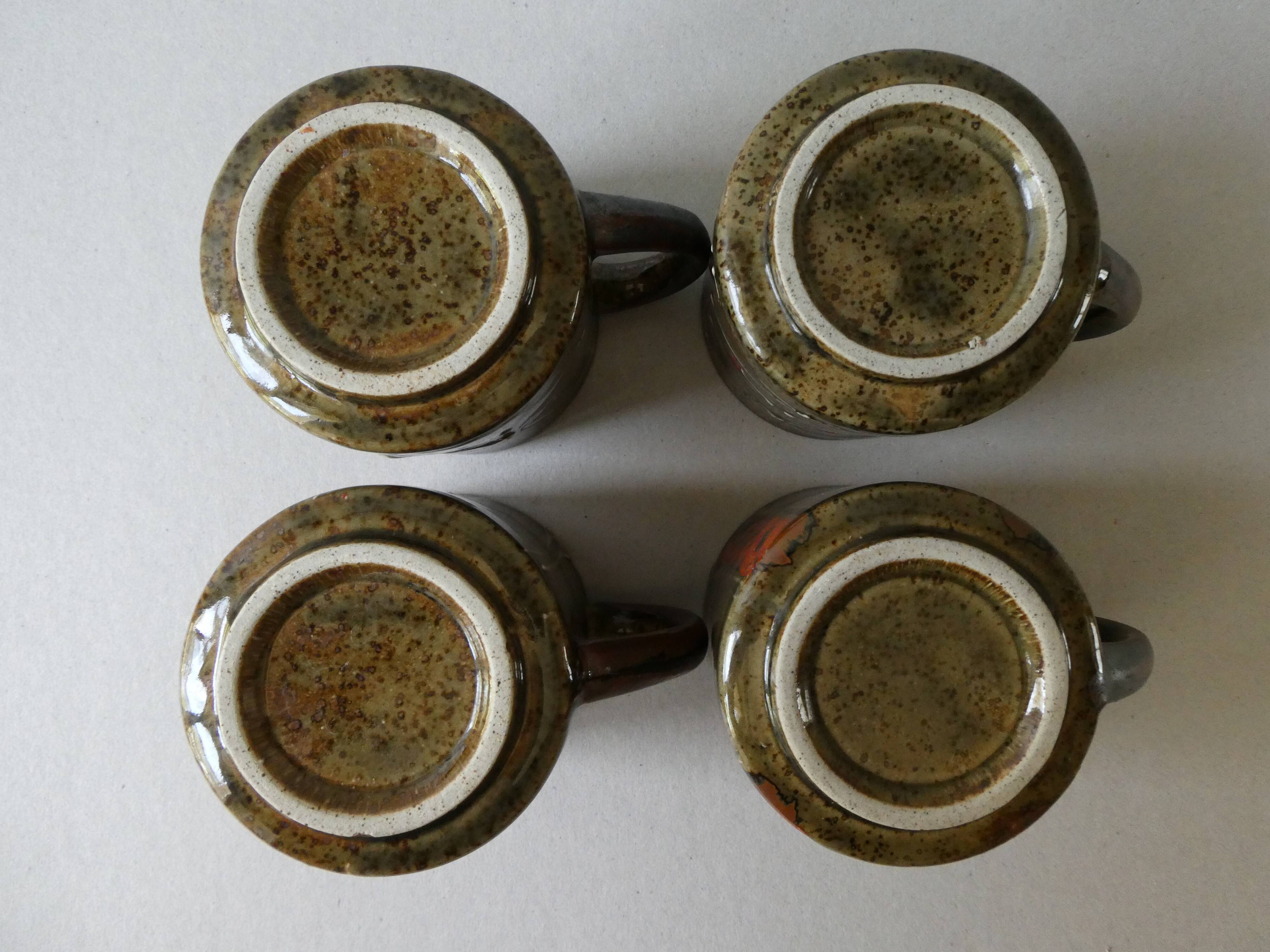 Set of 4  sandstone mugs 70 years