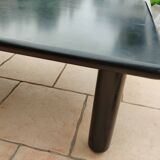 Old vintage wooden coffee table with tubular base
