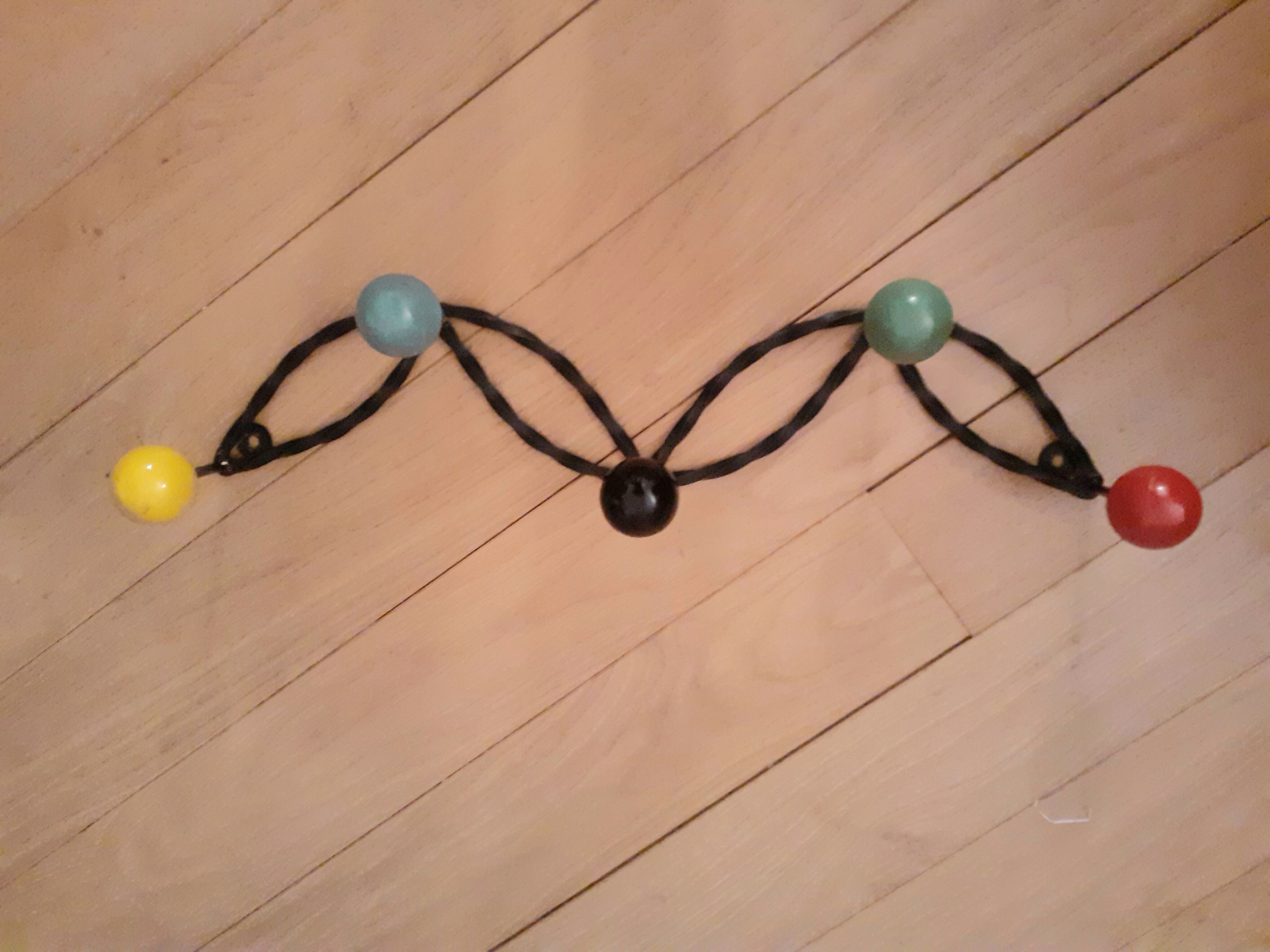 Wrought iron coat rack and wooden balls 5 hooks