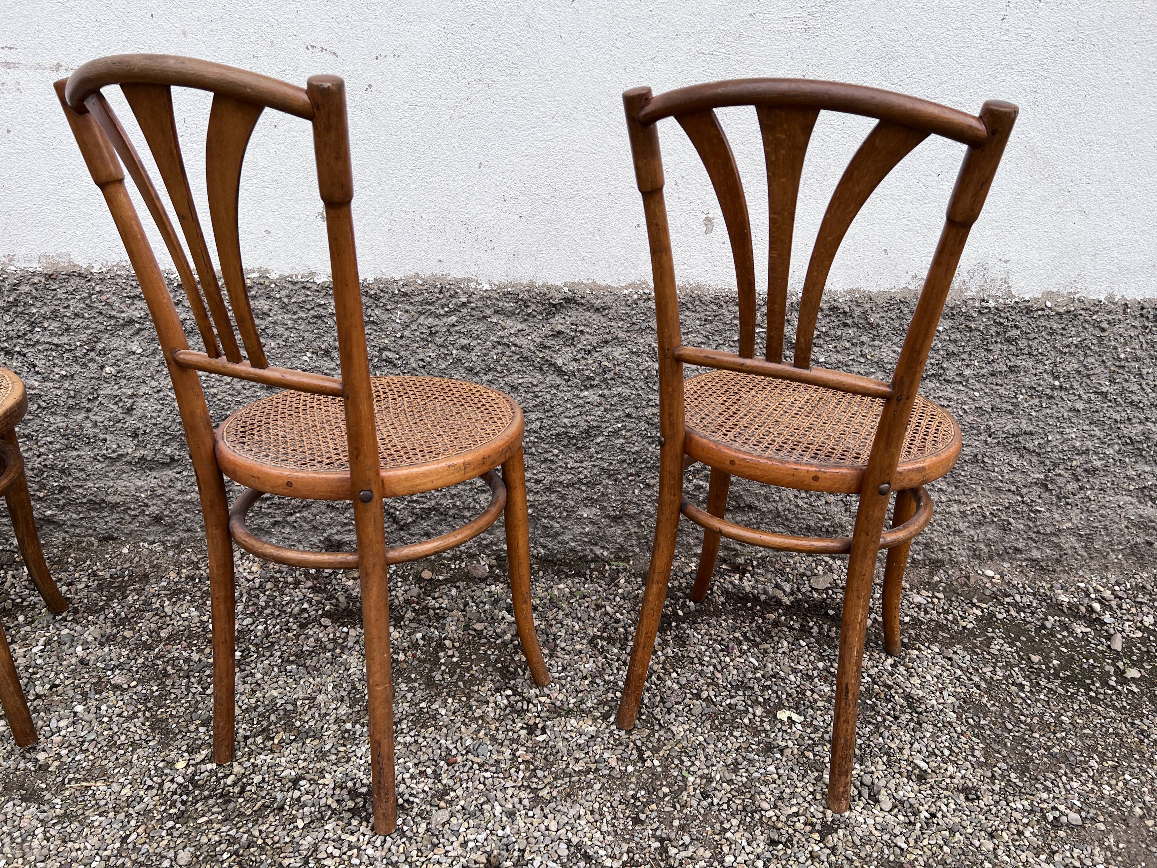Series of 4 wooden chairs and cannage