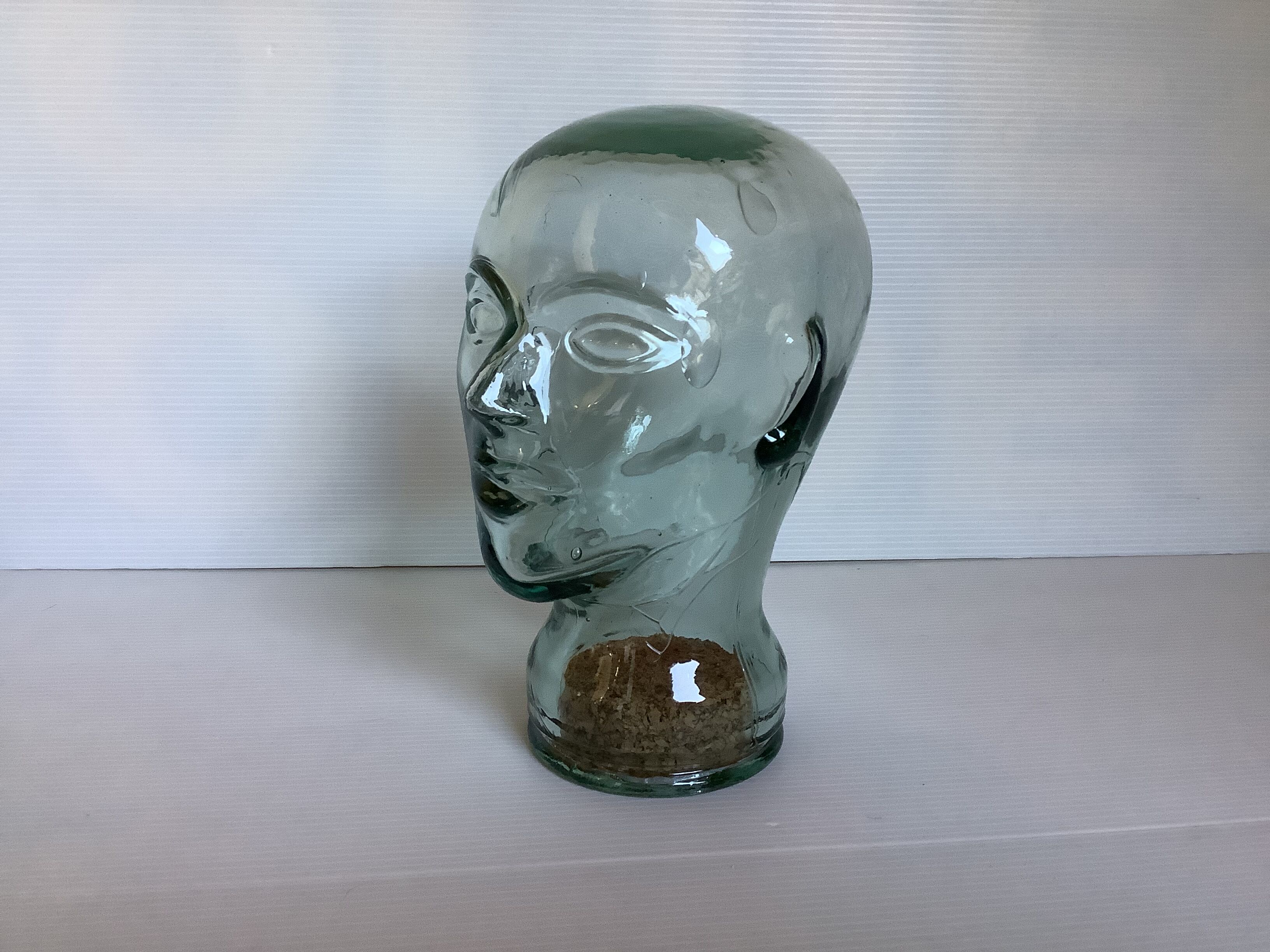 Green glass head