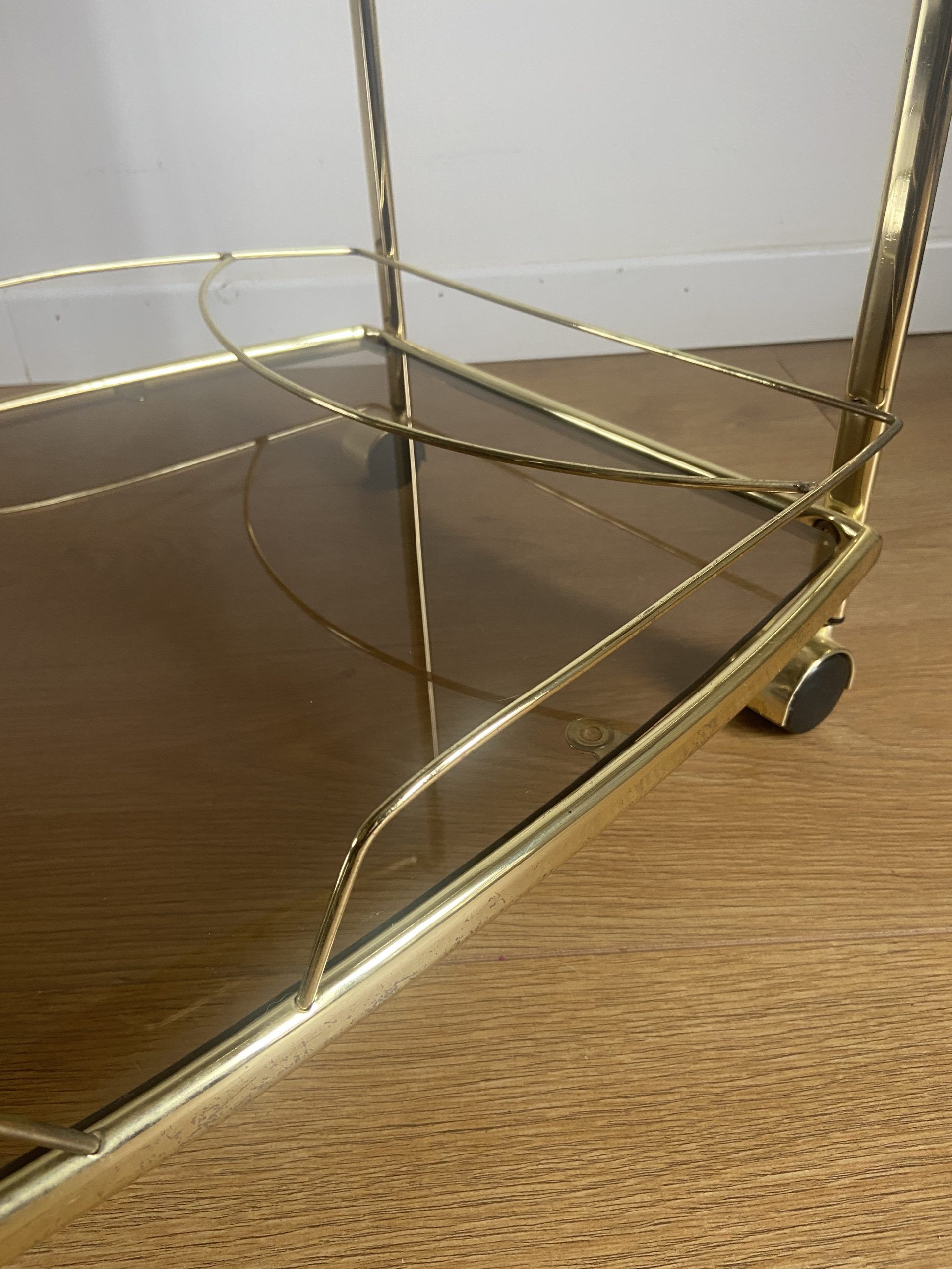 Vintage rolling service in gilded metal and smoked glass
