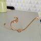 Old coat hook in solid golden brass