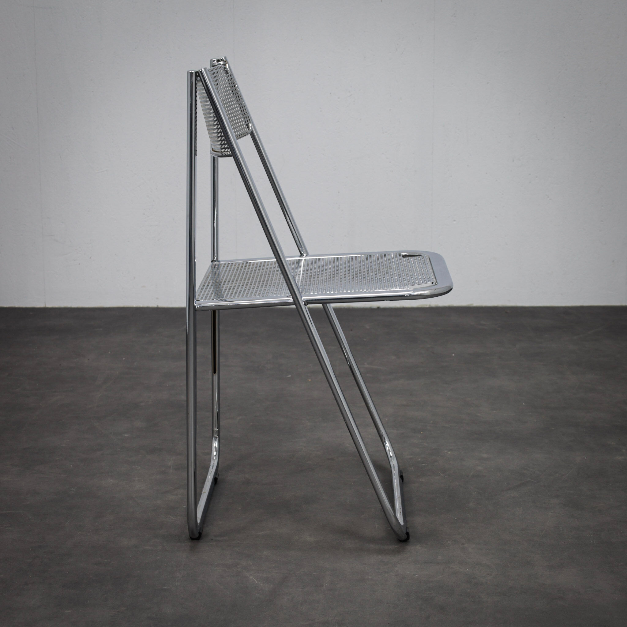 "Tamara" perforated metal folding chair by Arrben Italy (1980s)