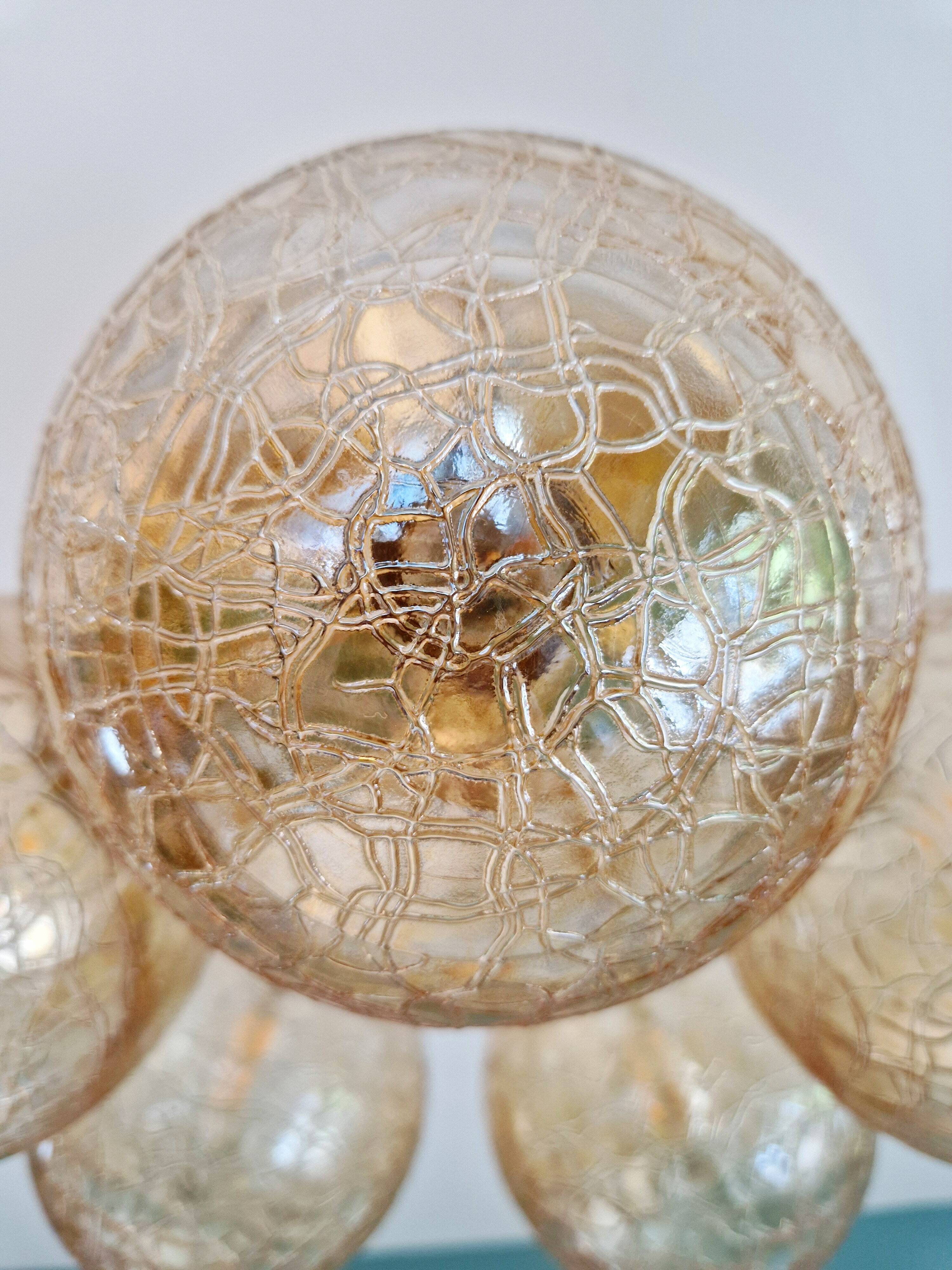 Large designer ceiling light in brass and amber crackled glass, 1970s.