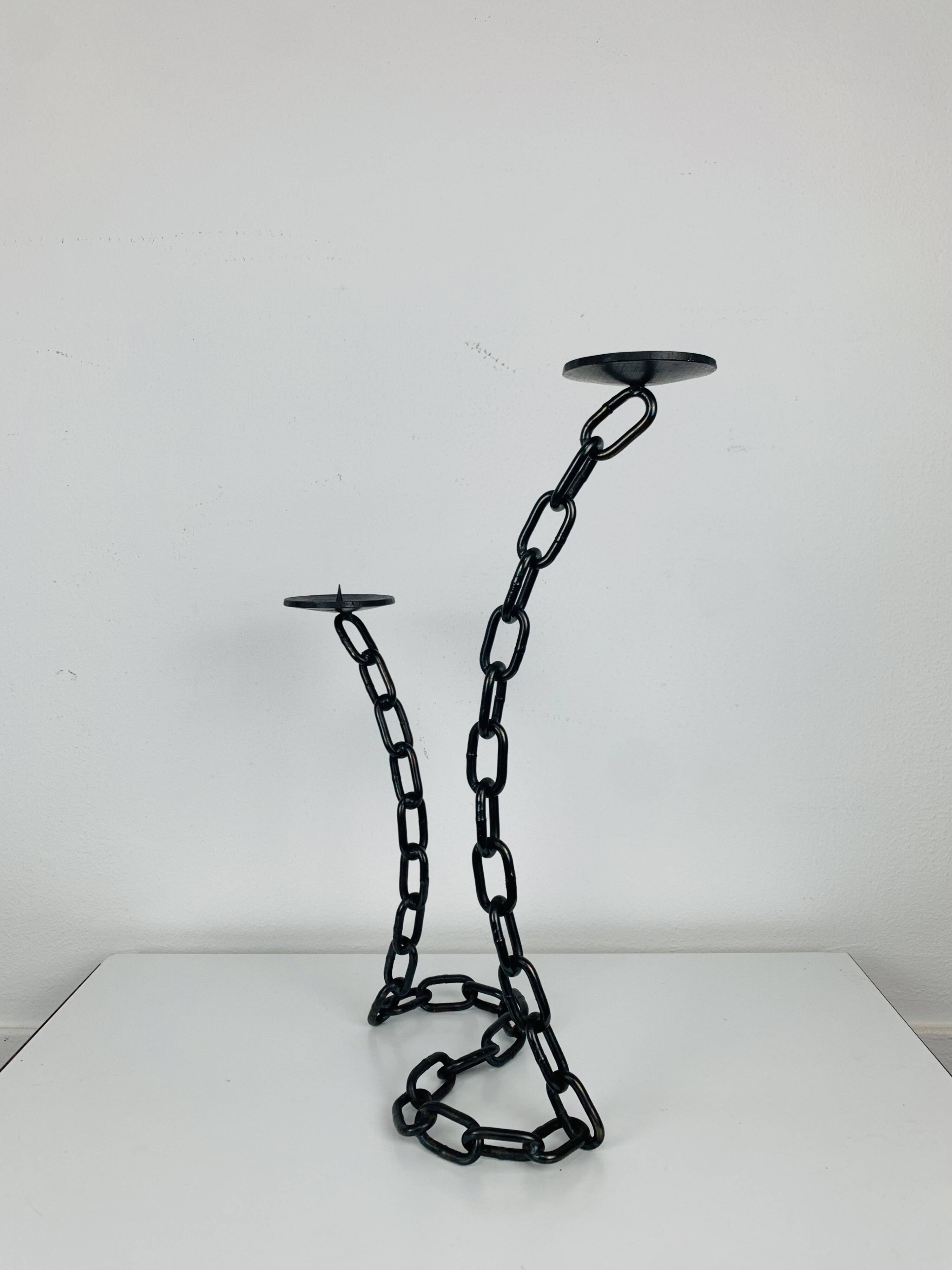 Brutalist and sculptural candle holder in wrought iron, chain links