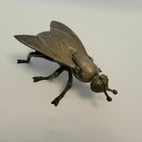 Old brass ashtray in the shape of a fly