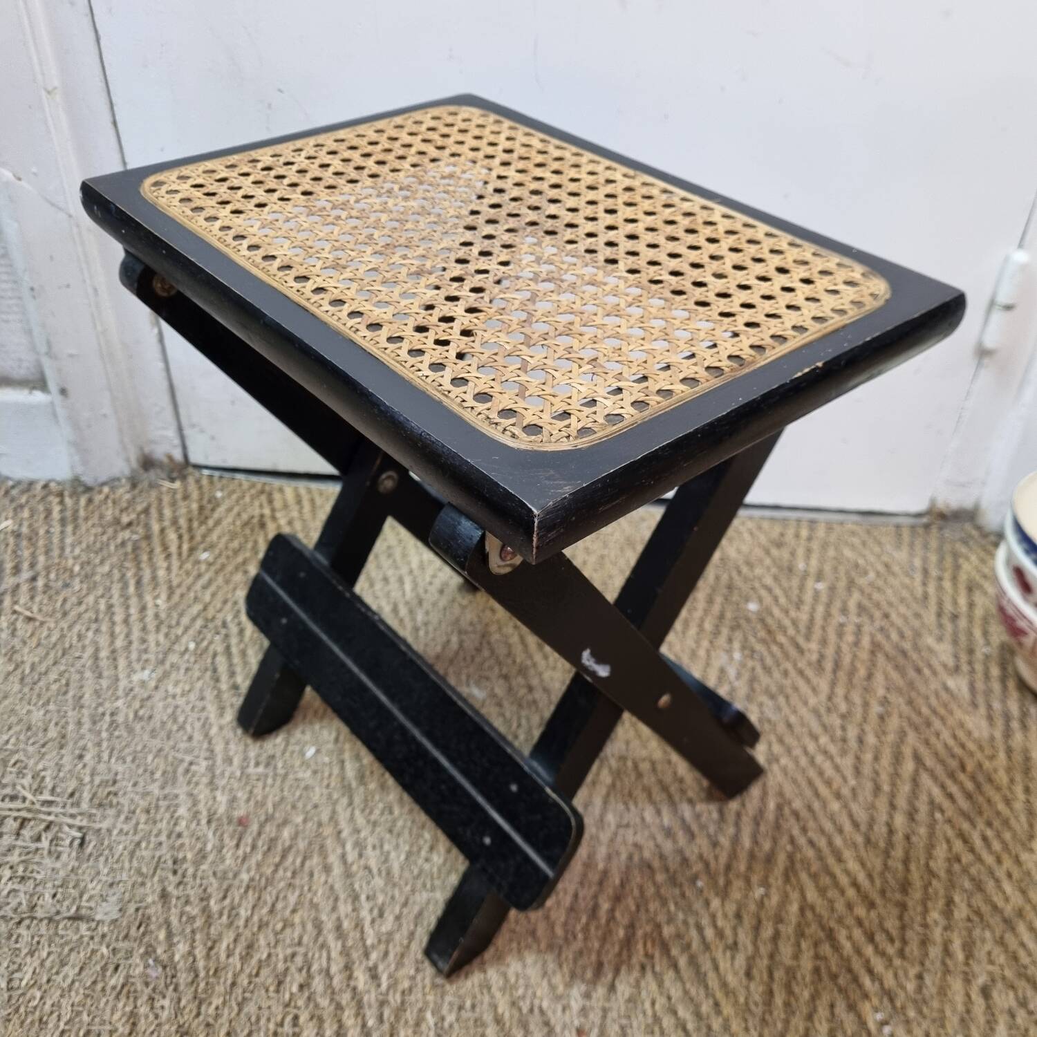 Cannage rattan footrest stool from 1970