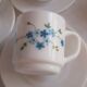 Coffee pot and forget-me-not cups
