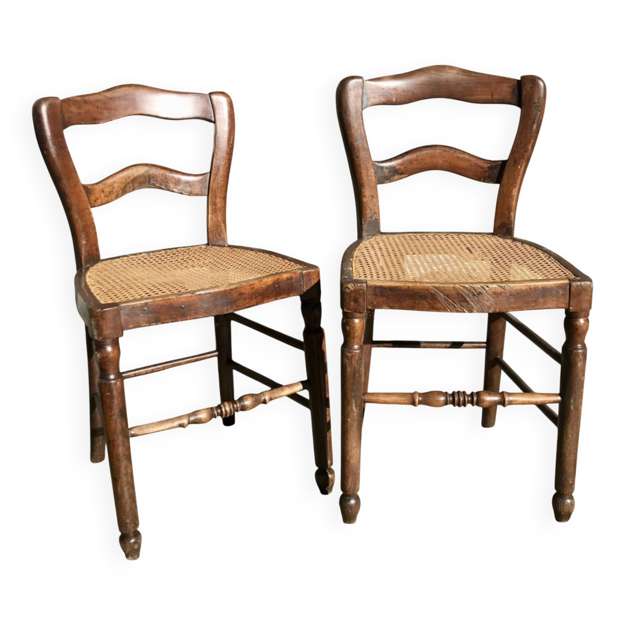 Pair of turned wooden chairs with caning