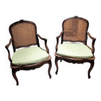 Pair of gourdin model flat-back armchairs