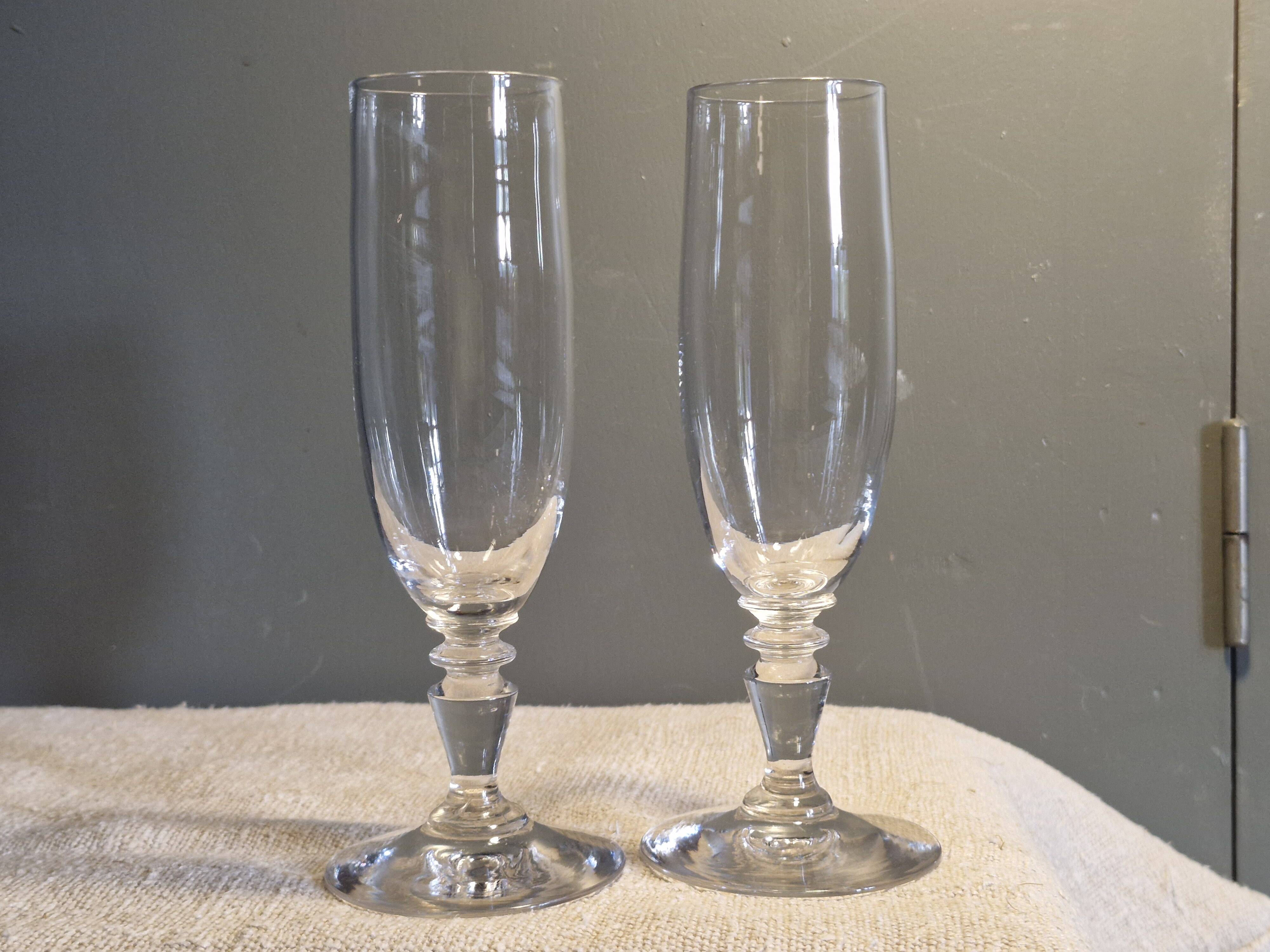 2 antique crystal champagne flutes