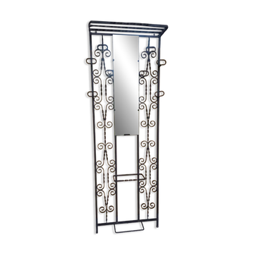 Large vintage wall coat rack in wrought iron with mirror and shelf.