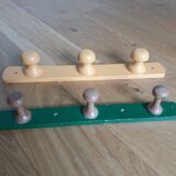 Wall-mounted coat rack with 3 mushroom-shaped hooks