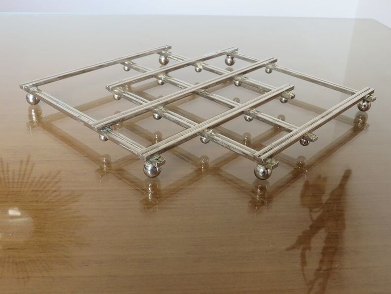 Extendable silver metal underside 40s 50s