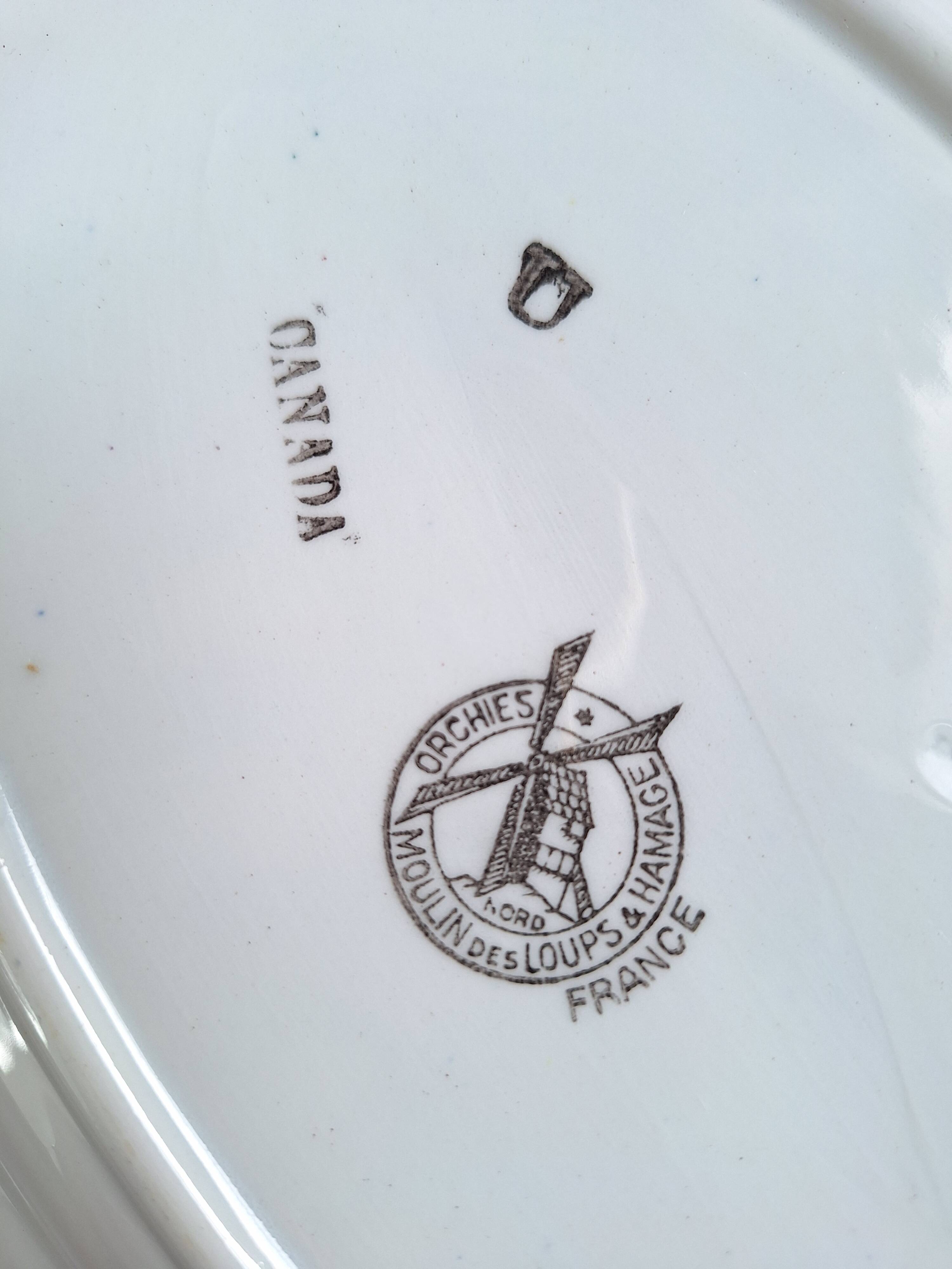 Oval plate Moulin des Loups Canada blue and orange, 1920-40