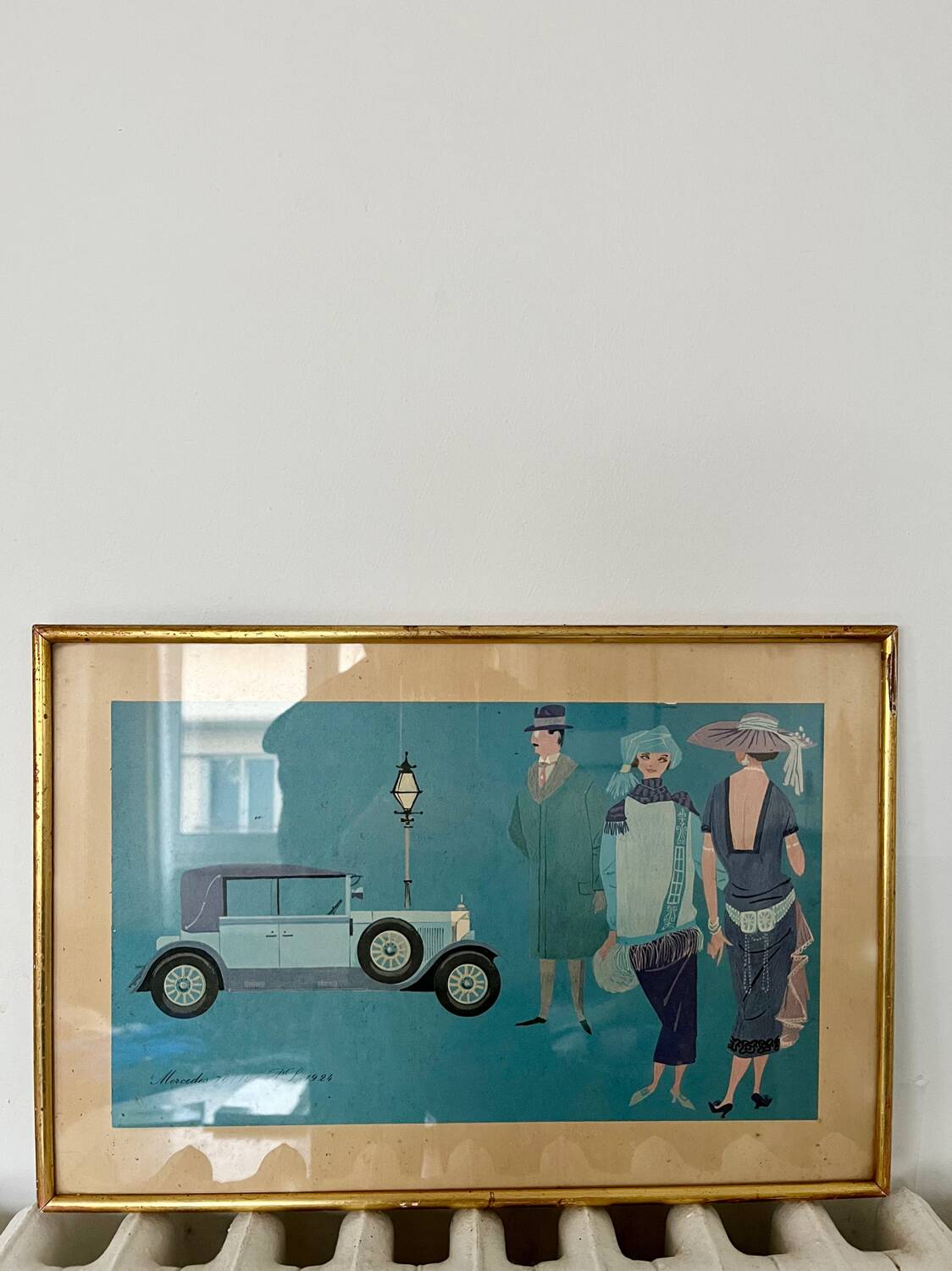 Vintage framed automotive poster