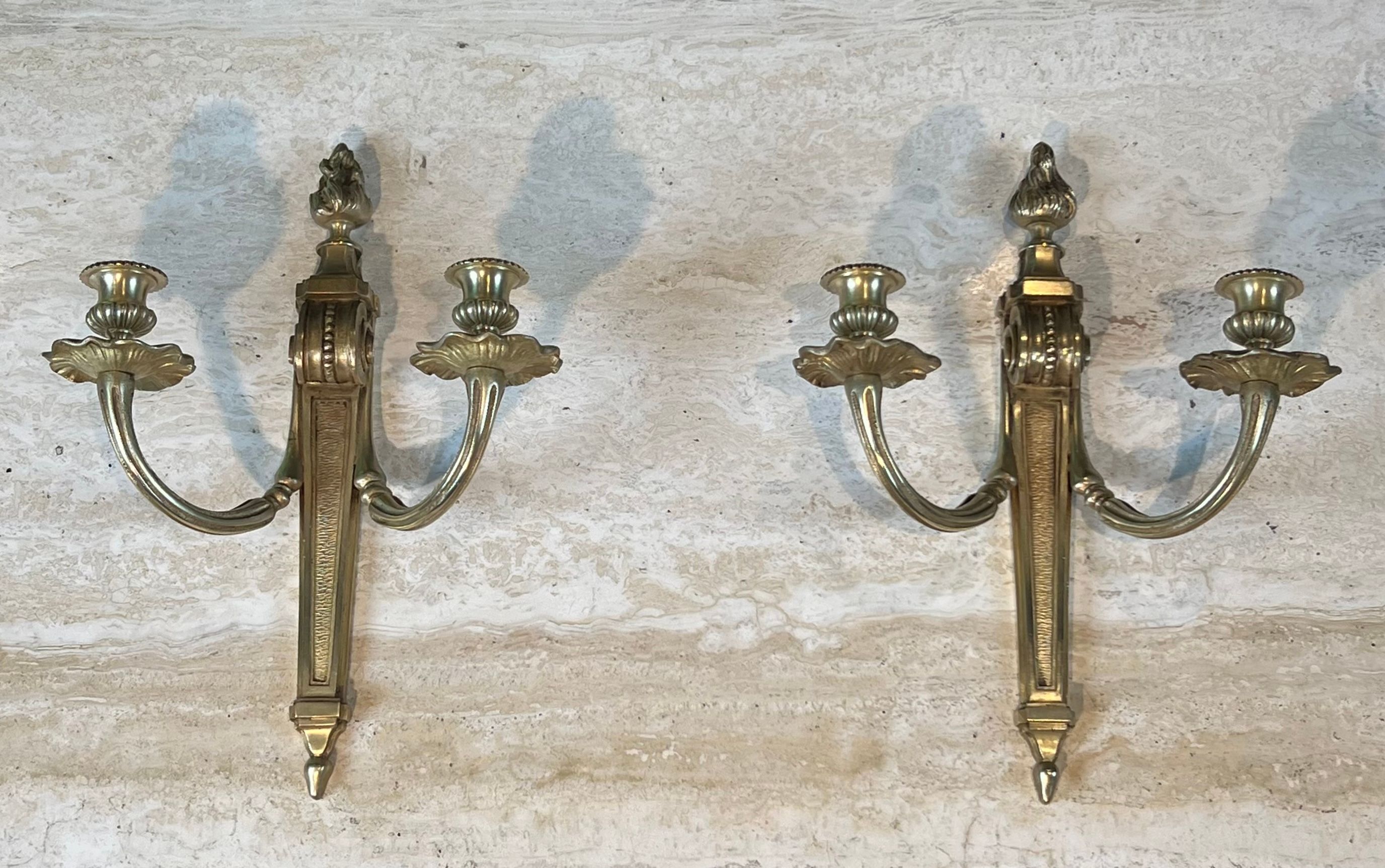 Pair of Louis XVI style bronze wall sconces