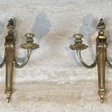 Pair of Louis XVI style bronze wall sconces