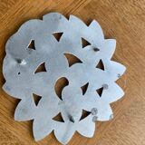 Metal underside foliage pattern