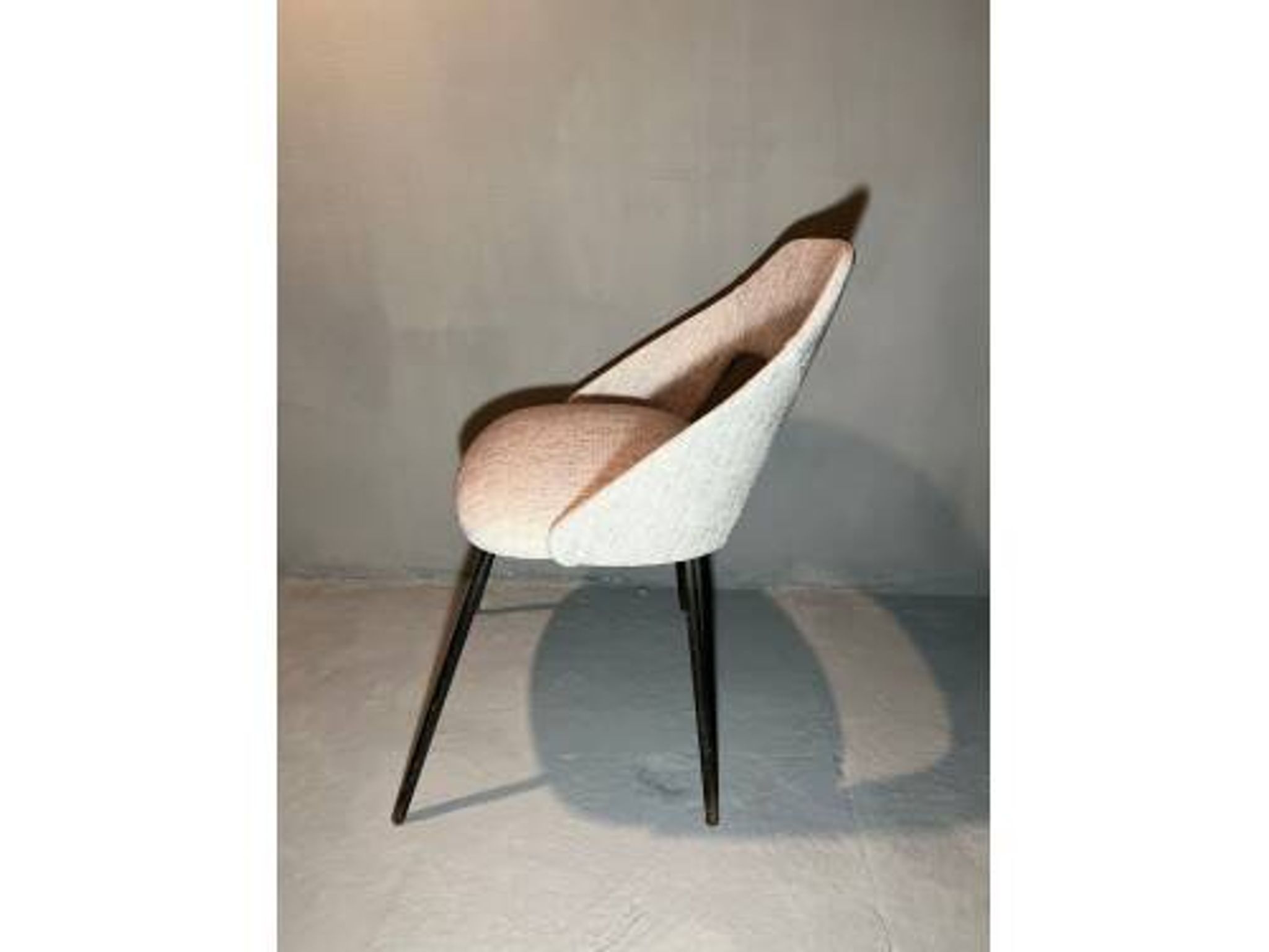 Pair of barrel chairs from the 1950s, in the style of Pierre Guariche.