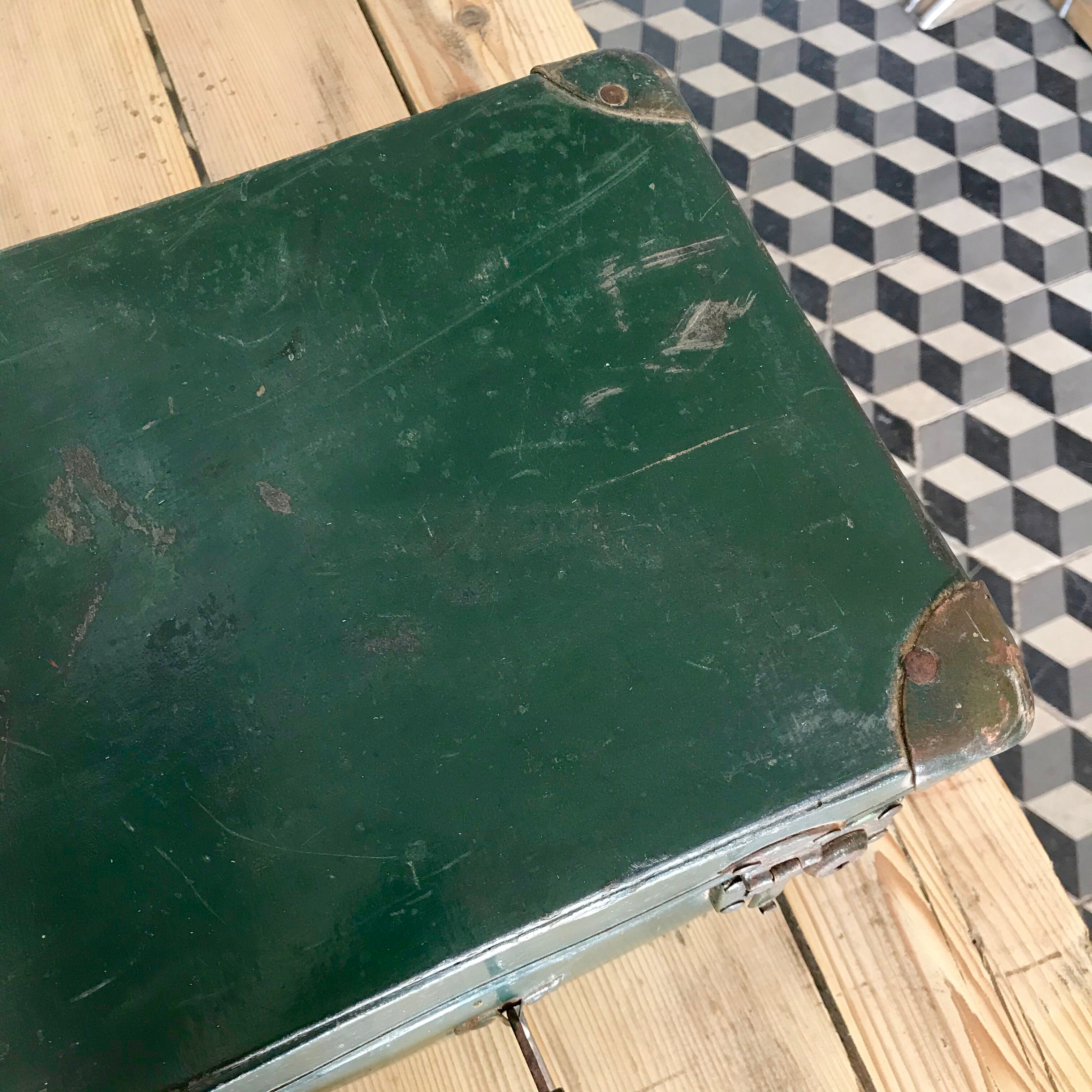 Valise verte vintage