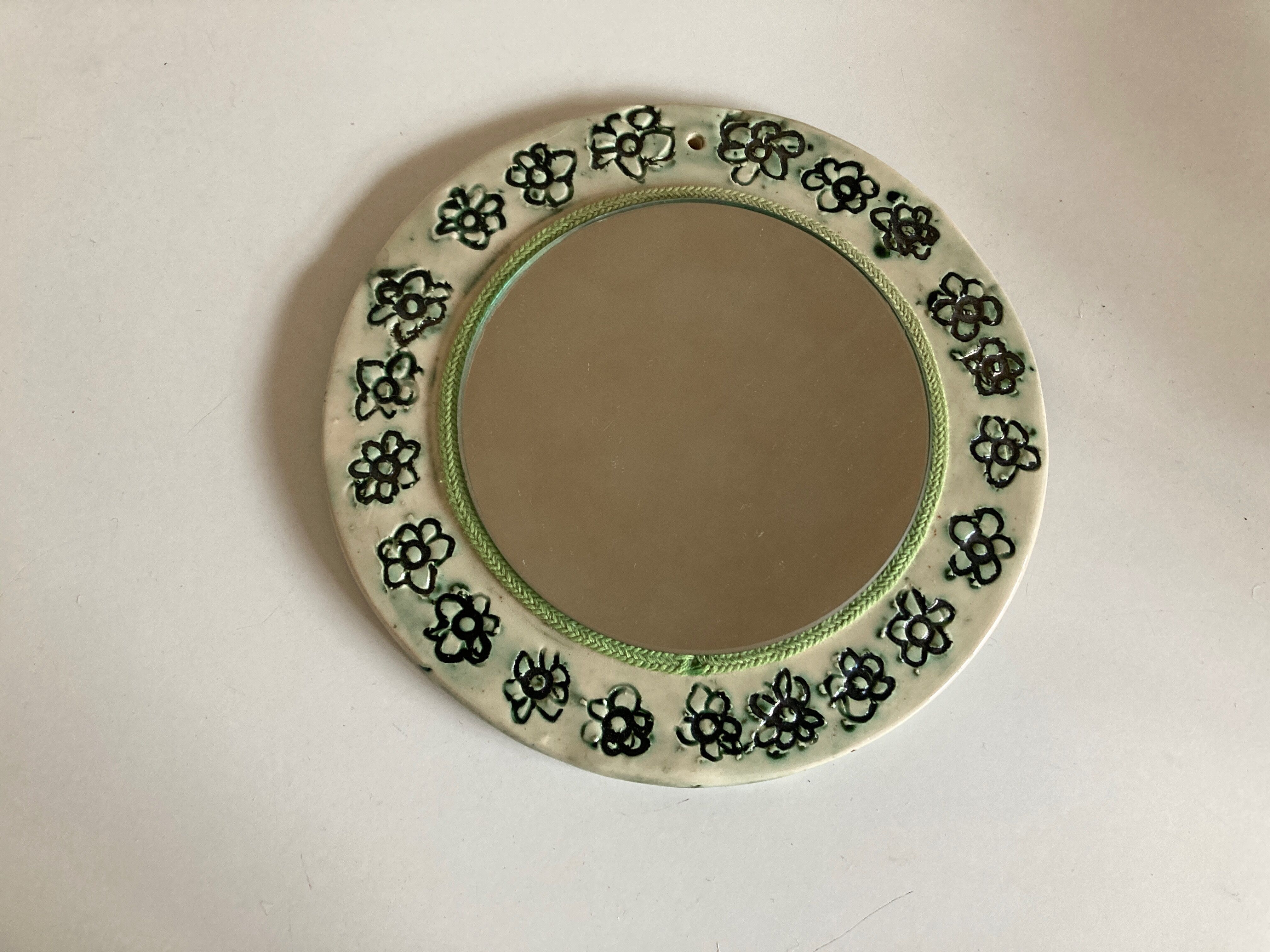 Incised ceramic mirror with flowers 1960