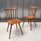 Pair of bistro chairs with bars