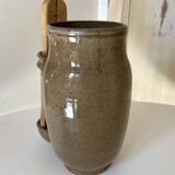 Old varnished stoneware pickle pot with tongs