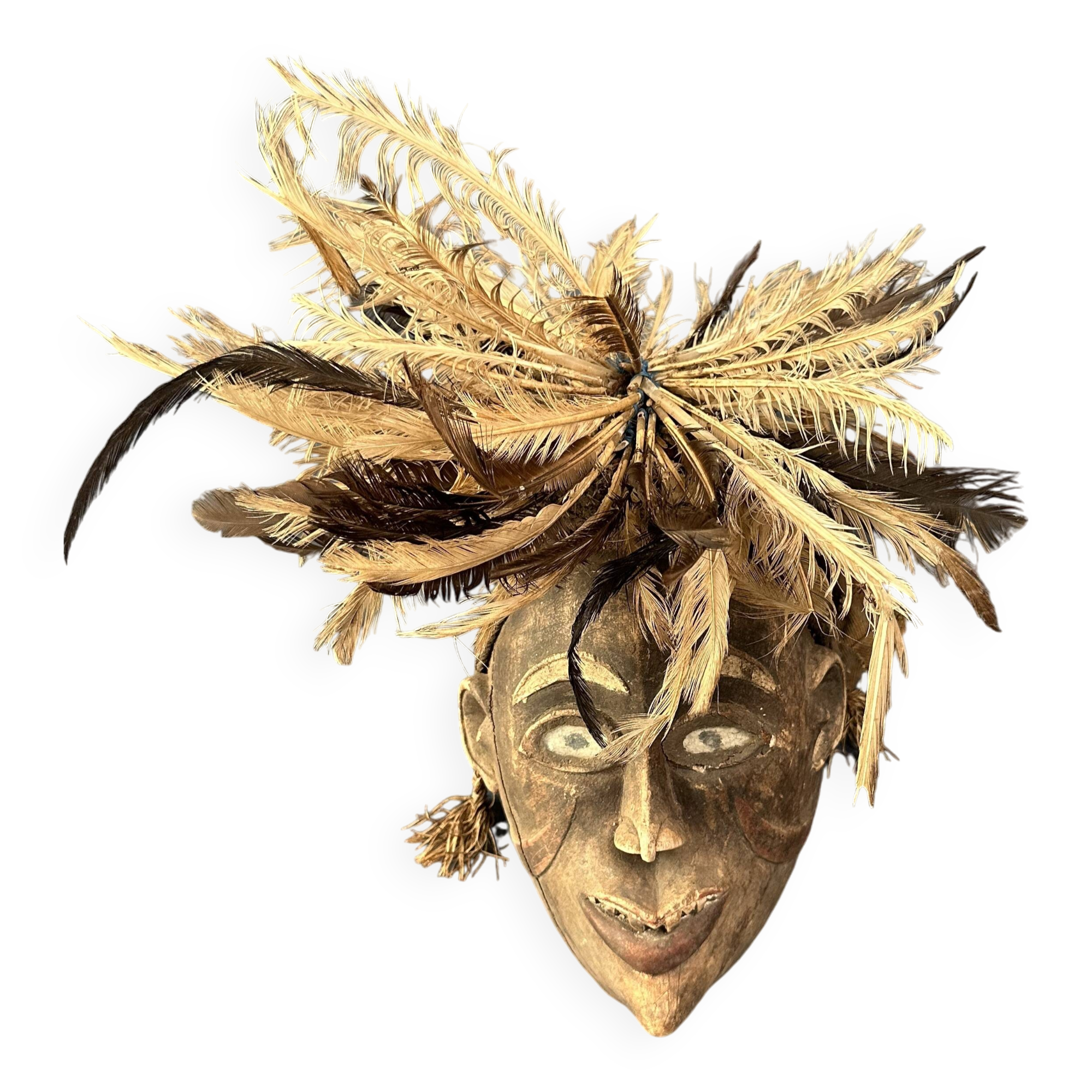 Tribal mask with feather head-decoration