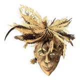 Tribal mask with feather head-decoration